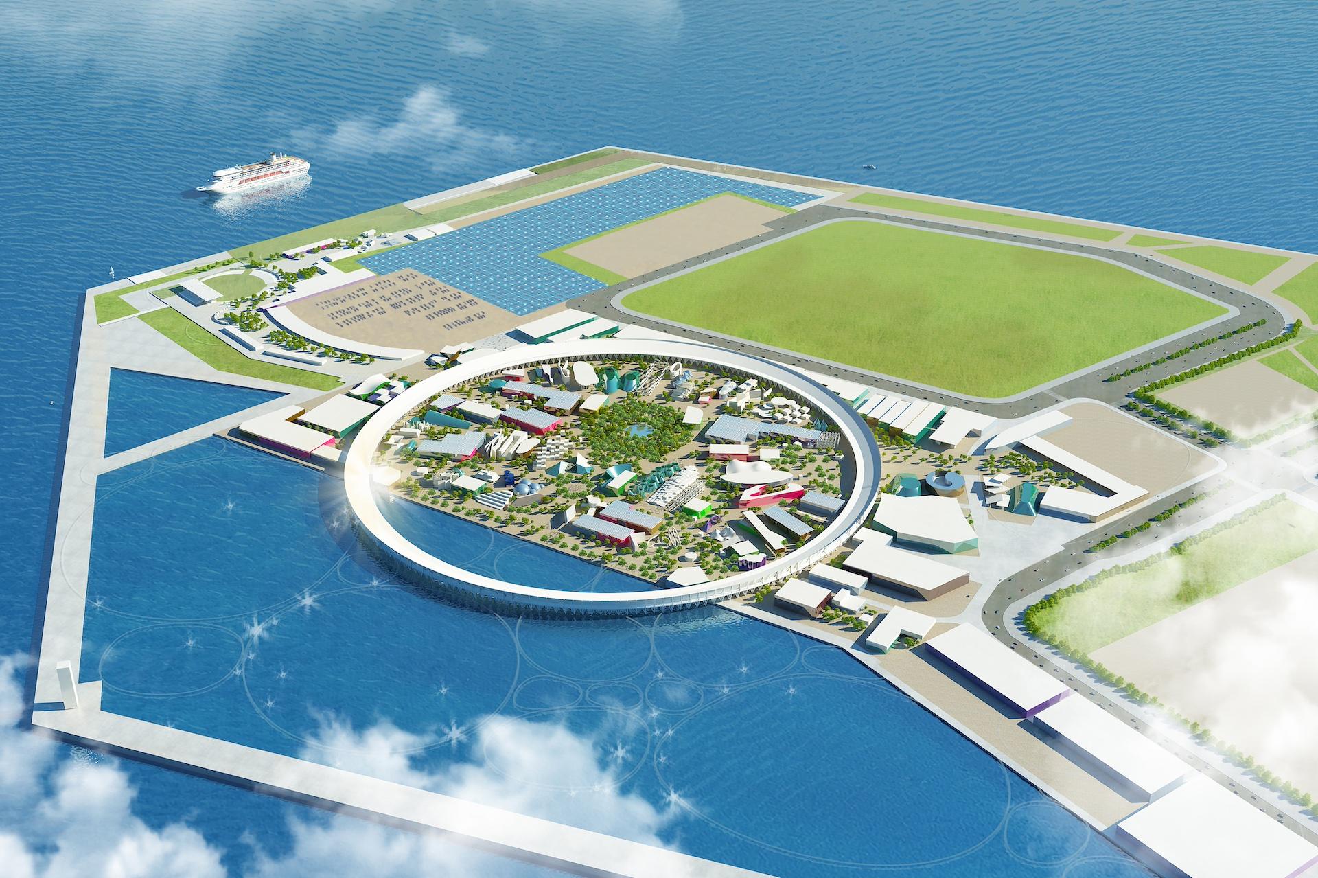 An aerial view of a rendering of the man-made island off the coast of Osaka. In the middle you see the ring where Expo is being held. It is surrounded by a green field and the ocean.